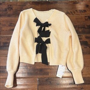 Commense Cream Cardigan with Black Bows